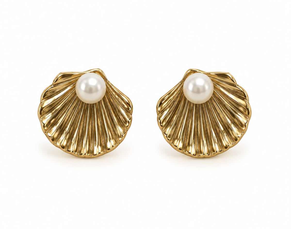Aretes concha con perla