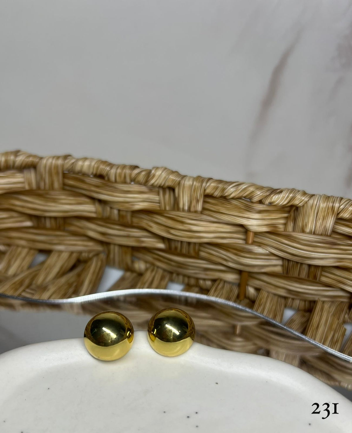Aretes bolita