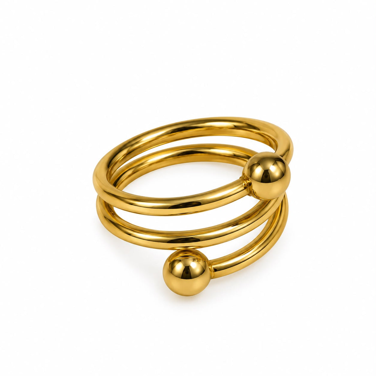 Anillo dorado con bolitas
