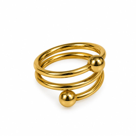Anillo dorado con bolitas